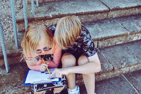 Two children working on homework